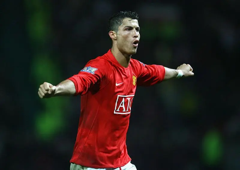 MANCHESTER, UNITED KINGDOM - NOVEMBER 15:  Cristiano Ronaldo of Manchester United celebrates  scoring his team's fifth goal during the Barclays Premier League match between Manchester United and Stoke City at Old Trafford on November 15, 2008 in Manchester, England.  (Photo by Alex Livesey/Getty Images)