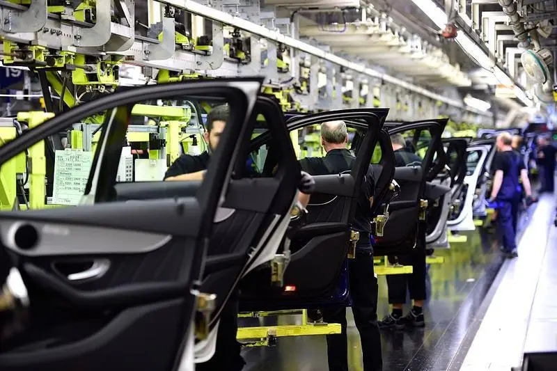 BREMEN, GERMANY - JANUARY 24: Workers oversee production of C-Class sedans on the assembly line of Mercedes-Benz on January 24, 2017 in Bremen, Germany. Daimler AG, which owns Mercedes, is scheduled to present its financial results for 2016 on February 2. Many German automakers are concerned over recent comments by U.S. President Donald Trump over possible tariffs on cars produced outside of the USA. (Photo by Alexander Koerner/Getty Images)