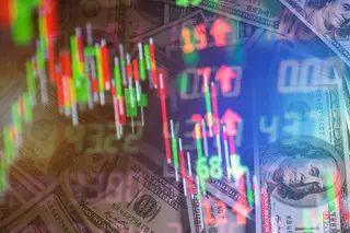 Double exposure of stock market in tablet with money and chart.