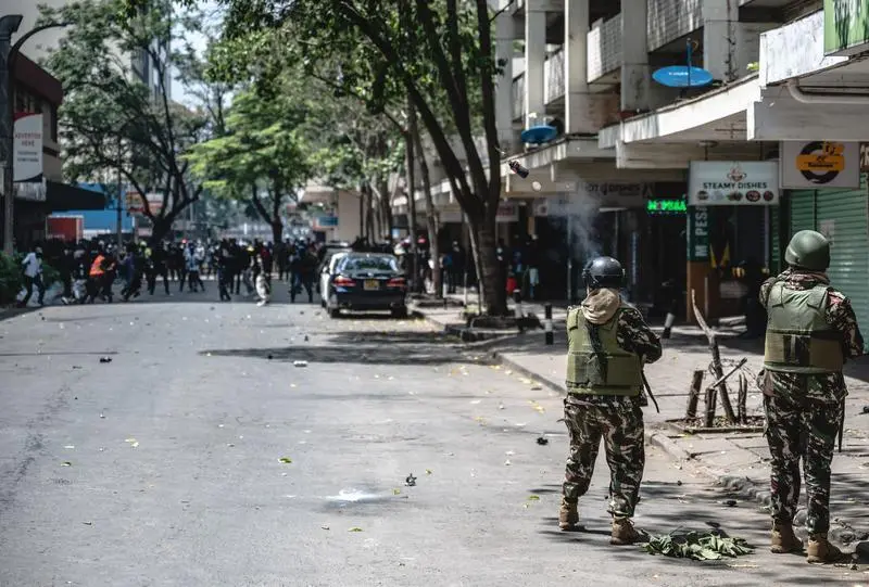 NAIROBI, June 26, 2024  -- Anti-riot police fire tear gas to disperse demonstrators during an anti-tax hike protest in downtown Nairobi, capital of Kenya, June 25, 2024. At least five protestors were shot dead and more than 150 others injured in Kenya on Tuesday as protests erupted countrywide for the second week in a row against new taxation measures proposed by President William Ruto's administration.
   In Nairobi, at least four protestors were killed as they stormed parliament buildings, a few hours after the lawmakers passed a contentious law that seeks to raise taxes, while the first person was shot on the streets in the capital.
Europa Press/Contacto/Wang Guansen
25/6/2024