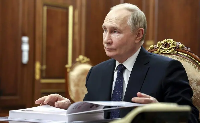 June 1, 2024, Moscow, Moscow Oblast, Russia: Russian President Vladimir Putin, listens to Circle of Kindness Foundation Archpriest Alexander Tkachenko during face-to-face meeting at the Kremlin, June 1, 2024, in Moscow, Russia. The meeting was to celebrate International Children's Day and thank the charity for helping children.,Image: 878387643, License: Rights-managed, Restrictions: , Model Release: no, Credit line: Alexander Kazakov/Kremlin Pool / Zuma Press / ContactoPhoto