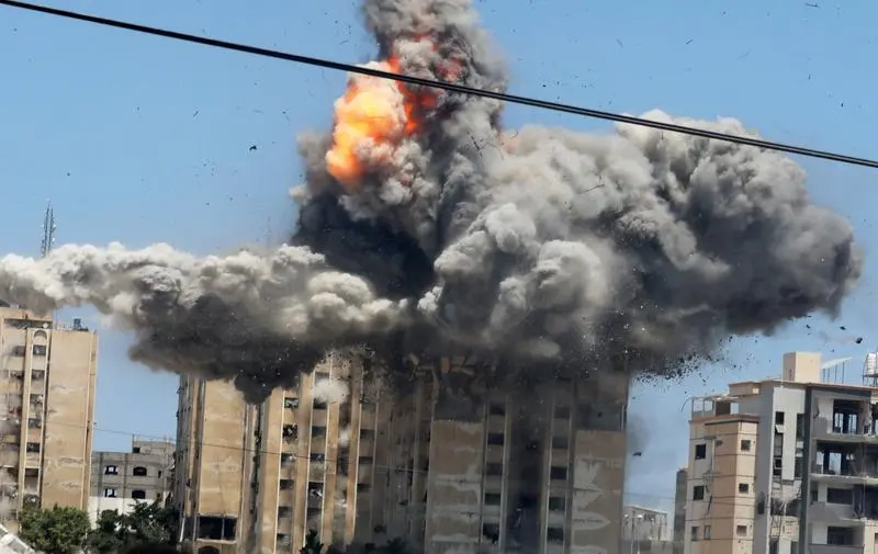July 20, 2024, Nusairat, Gaza Strip, Palestinian Territory: Heavy smoke and fire billow following an Israeli military strike on building in Al-Nusairat central of Gaza strip, on July 20, 2024. amid the ongoing conflict between Israel and the Palestinian militant group Hamas,Image: 891039010, License: Rights-managed, Restrictions: , Model Release: no, Credit line: Omar Ashtawy / Zuma Press / ContactoPhoto