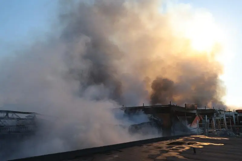 May 25, 2024, Kharkiv, Ukraine: KHARKIV, UKRAINE - MAY 25, 2024 - Smoke rises over an Epicentr K construction supermarket hit with two Russian glide bombs, Kharkiv, northeastern Ukraine. At least five people have been killed and 35 others wounded in the attack.,Image: 876428801, License: Rights-managed, Restrictions: , Model Release: no, Credit line: Vyacheslav Madiyevskyy / Zuma Press / ContactoPhoto
