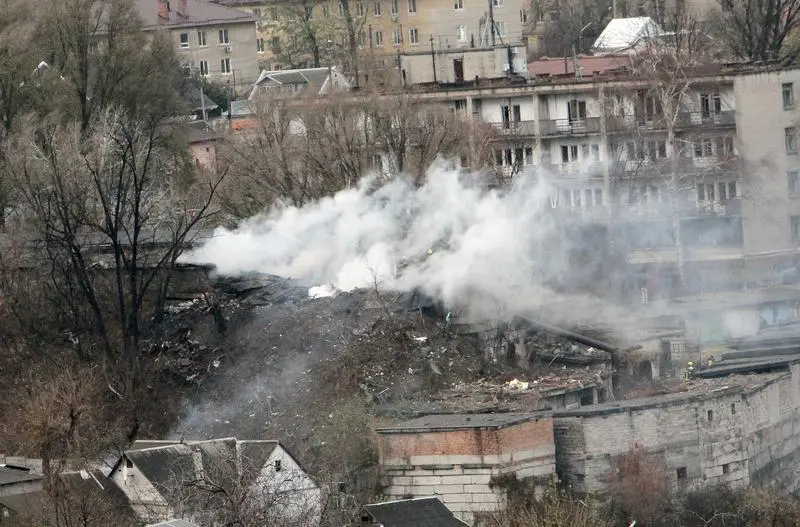 November 21, 2024, Dnipro, Ukraine: DNIPRO, UKRAINE - NOVEMBER 21, 2024 - A pillar of smoke rises over a garage cooperative damaged by the Russian missile strike, Dnipro, east-central Ukraine. On Thursday morning, November 21, Russians launched an intercontinental ballistic missile, a Kinzhal, and seven Kh-101 cruise missiles at Dnipro. The Ukrainian air defence units intercepted six Kh-101 missiles.,Image: 937324937, License: Rights-managed, Restrictions: , Model Release: no, Credit line: Mykola Miakshykov / Zuma Press / ContactoPhoto