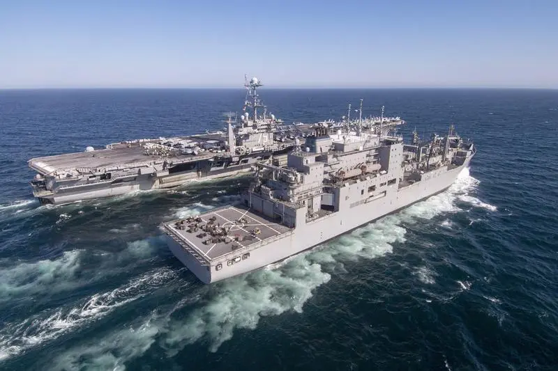 240425-N-FY193-1809 ATLANTIC OCEAN (April 25, 2024) Nimitz-class aircraft carrier USS Harry S. Truman (CVN 75) maneuvers into position with the Lewis and Clark-class dry cargo ship USNS Robert E. Peary (T-AKE 5), April 25, 2024. Truman is the flagship of the Harry S. Truman Carrier Strike Group and is currently underway as part of the basic phase. (Photo by Mass Communication Specialist Seaman Mike Shen)