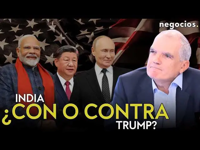Adrián Zelaia durante la entrevista en Negocios TV, con gráficos de la geopolítica mundial en el fondo.<br>                        <br>                        <br>                        <br>                      