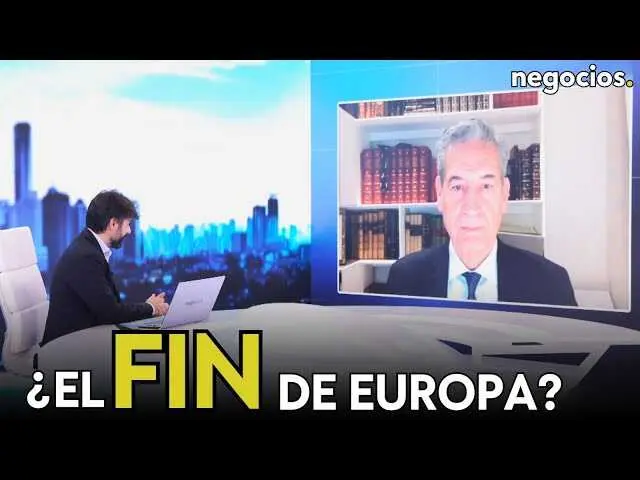 Retrato de Juan Antonio de Castro durante su intervención en Negocios TV, con fondo representativo de la Unión Europea.<br>                        <br>                        <br>                        <br>                      