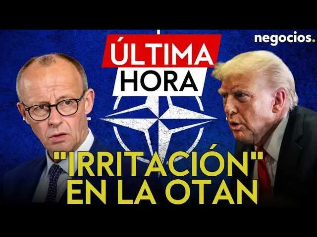 Retrato representativo del edificio de la OTAN con banderas ondeando al viento, simbolizando la alianza y su momento de tensi&oacute;n.<br>                        <br>                        <br>                        <br>                      