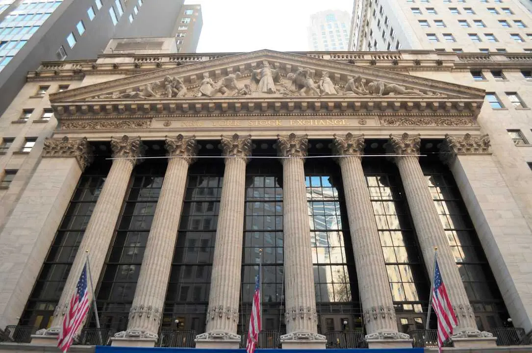 The New York Stock Exchange building seen on Wall Street in the Financial District in downtown Manhattan, New York City.