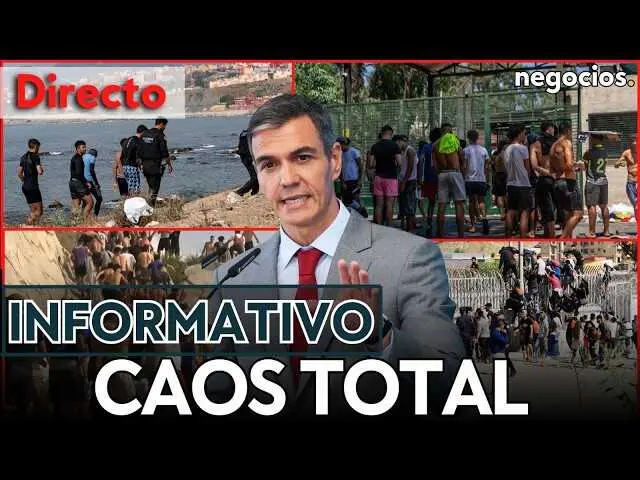 Vista de la frontera en Ceuta con una concentraci&oacute;n masiva de migrantes, reflejando la crisis migratoria actual.<br>                        <br>                        <br>                        <br>                      