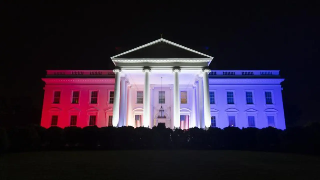Red, white and blue lanterns and lights are seen on the North Portico of the White House during the Fourth of July Celebration, Thursday, July 4, 2024. 
(Official White House Photo by Oliver Contreras)