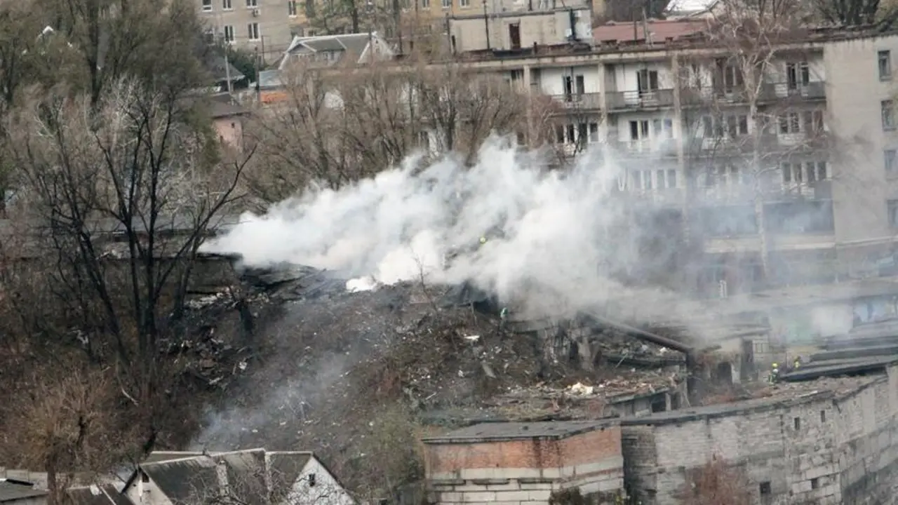 November 21, 2024, Dnipro, Ukraine: DNIPRO, UKRAINE - NOVEMBER 21, 2024 - A pillar of smoke rises over a garage cooperative damaged by the Russian missile strike, Dnipro, east-central Ukraine. On Thursday morning, November 21, Russians launched an intercontinental ballistic missile, a Kinzhal, and seven Kh-101 cruise missiles at Dnipro. The Ukrainian air defence units intercepted six Kh-101 missiles.,Image: 937324937, License: Rights-managed, Restrictions: , Model Release: no, Credit line: Mykola Miakshykov / Zuma Press / ContactoPhoto