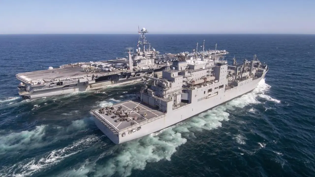 240425-N-FY193-1809 ATLANTIC OCEAN (April 25, 2024) Nimitz-class aircraft carrier USS Harry S. Truman (CVN 75) maneuvers into position with the Lewis and Clark-class dry cargo ship USNS Robert E. Peary (T-AKE 5), April 25, 2024. Truman is the flagship of the Harry S. Truman Carrier Strike Group and is currently underway as part of the basic phase. (Photo by Mass Communication Specialist Seaman Mike Shen)