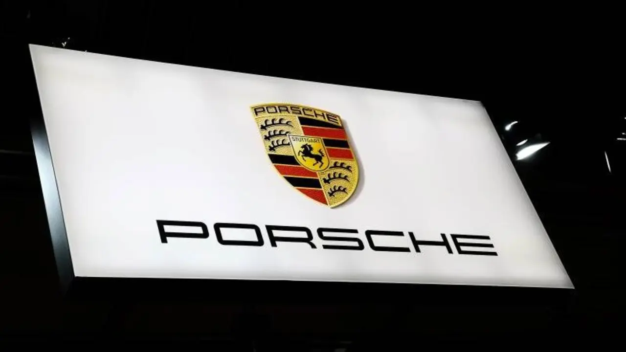 <h1>Porsche slides 6% amid EV models delay, DAX exit</h1>
