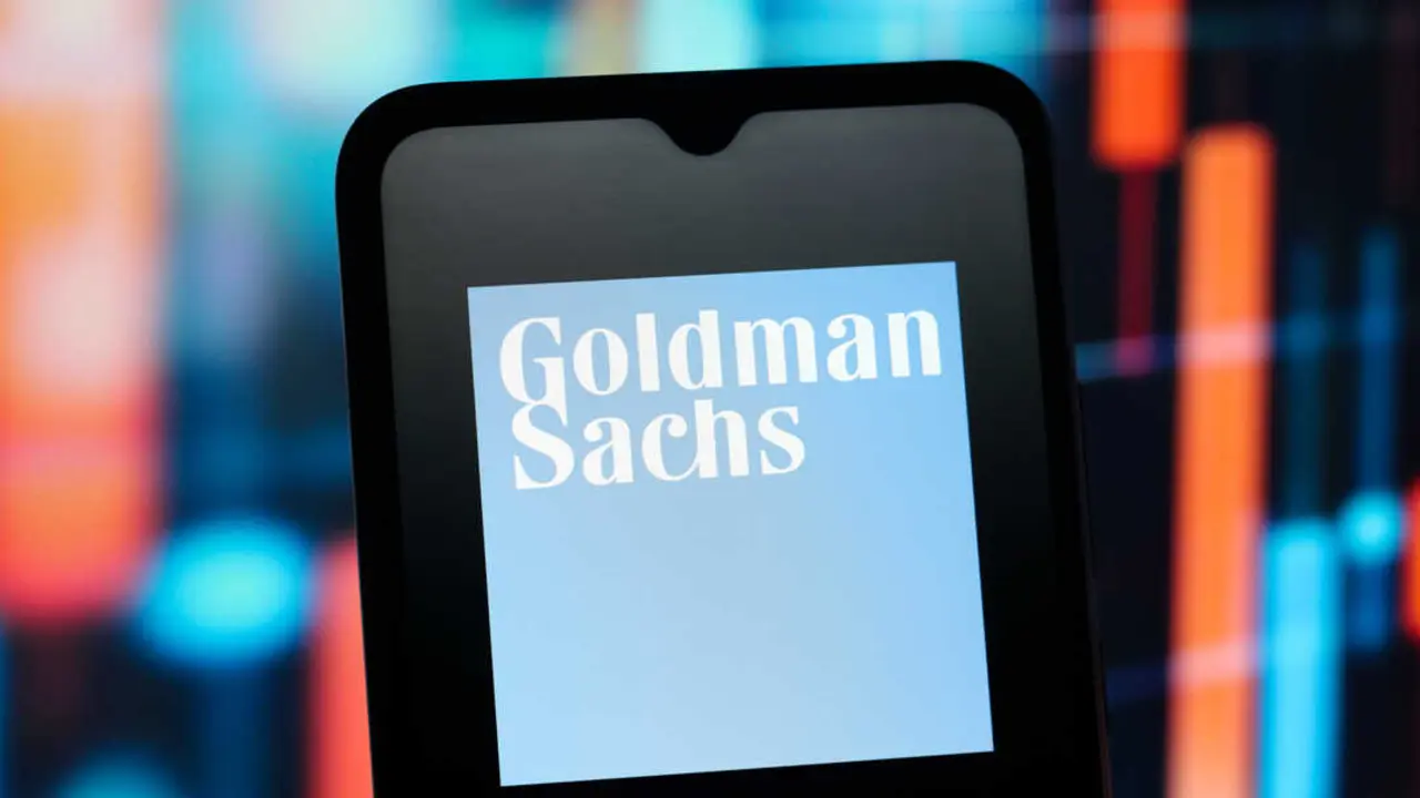 In this photo illustration, the Goldman Sachs (GS) logo is seen displayed on a smartphone screen