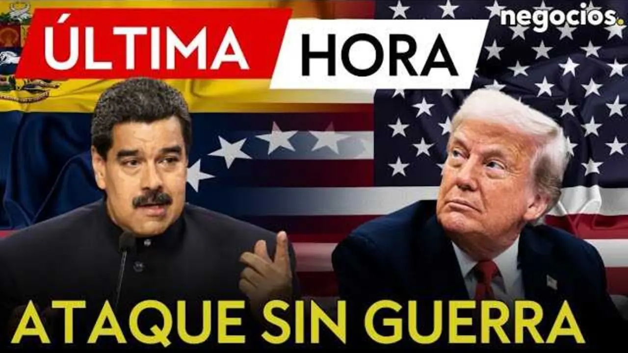 Fotografía de Nicolás Maduro con fondo de bandera venezolana y emblemas militares, ilustrando la situación de tensión con Estados Unidos.<br>                        <br>                        <br>                        <br>                      
