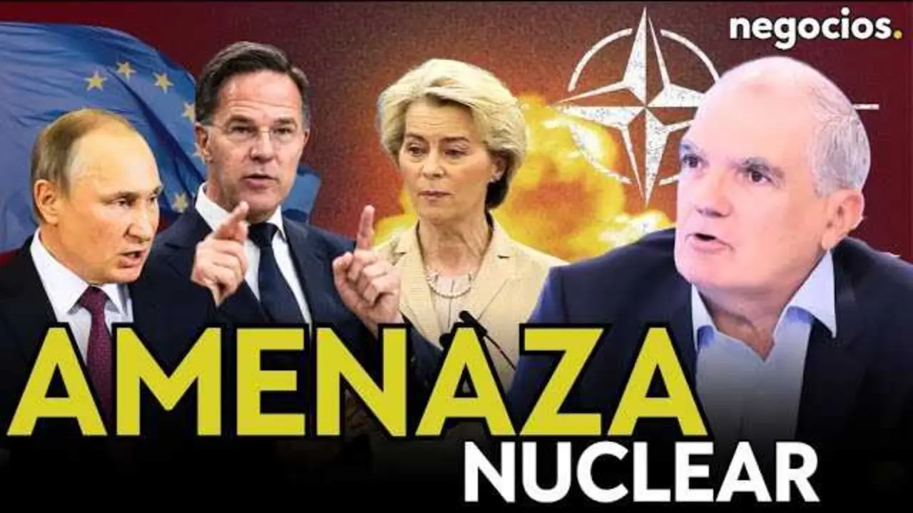 Vladimir Putin en rueda de prensa con fondo de la bandera rusa, simbolizando la tensión entre Rusia y la OTAN<br>                        <br>                        <br>                        <br>                      