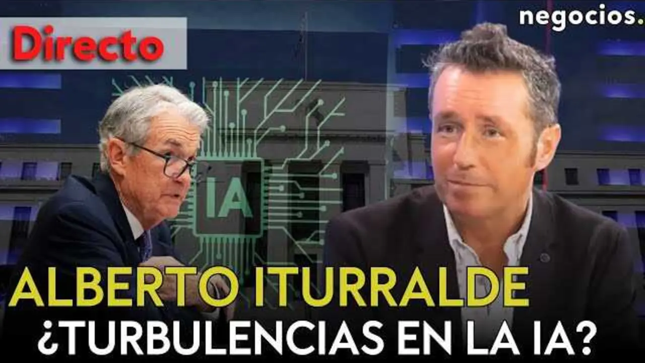 Captura en primer plano de Alberto Iturralde durante la transmisión en vivo en Negocios TV, con gráficos de mercado y referencias a inteligencia artificial en pantalla.<br>                        <br>                        <br>                        <br>                      