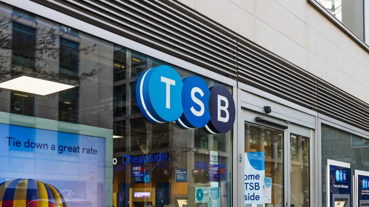 Exterior view of TSB bank branch with bright logo and glass front in a busy urban city environment. London, UK, 29 March 2024