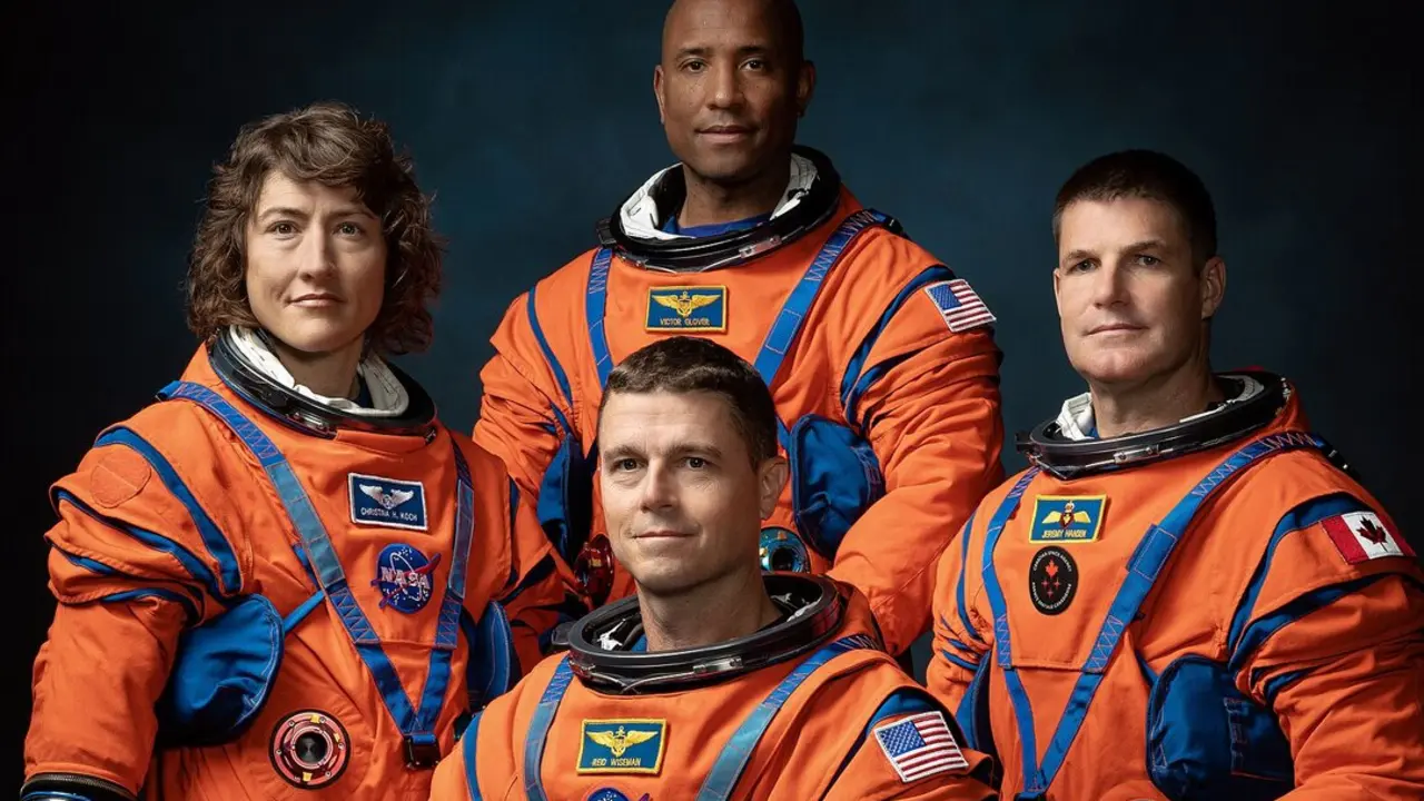 LOCATION: Bldg. 8, Room 183 - Photo Studio. SUBJECT: Official crew portrait for Artemis II, clockwise from left: NASA Astronauts Christina Koch, Victor Glover, Canadian Space Agency Astronaut Jeremy Hansen, NASA Astronaut Reid Wiseman. PHOTOGRAPHER: Josh Valcarcel