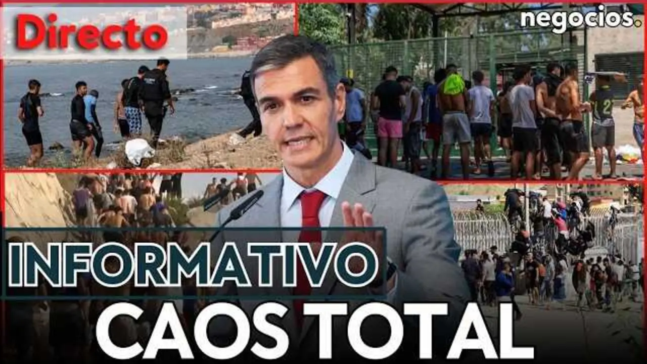 Vista de la frontera en Ceuta con una concentraci&oacute;n masiva de migrantes, reflejando la crisis migratoria actual.<br>                        <br>                        <br>                        <br>                      