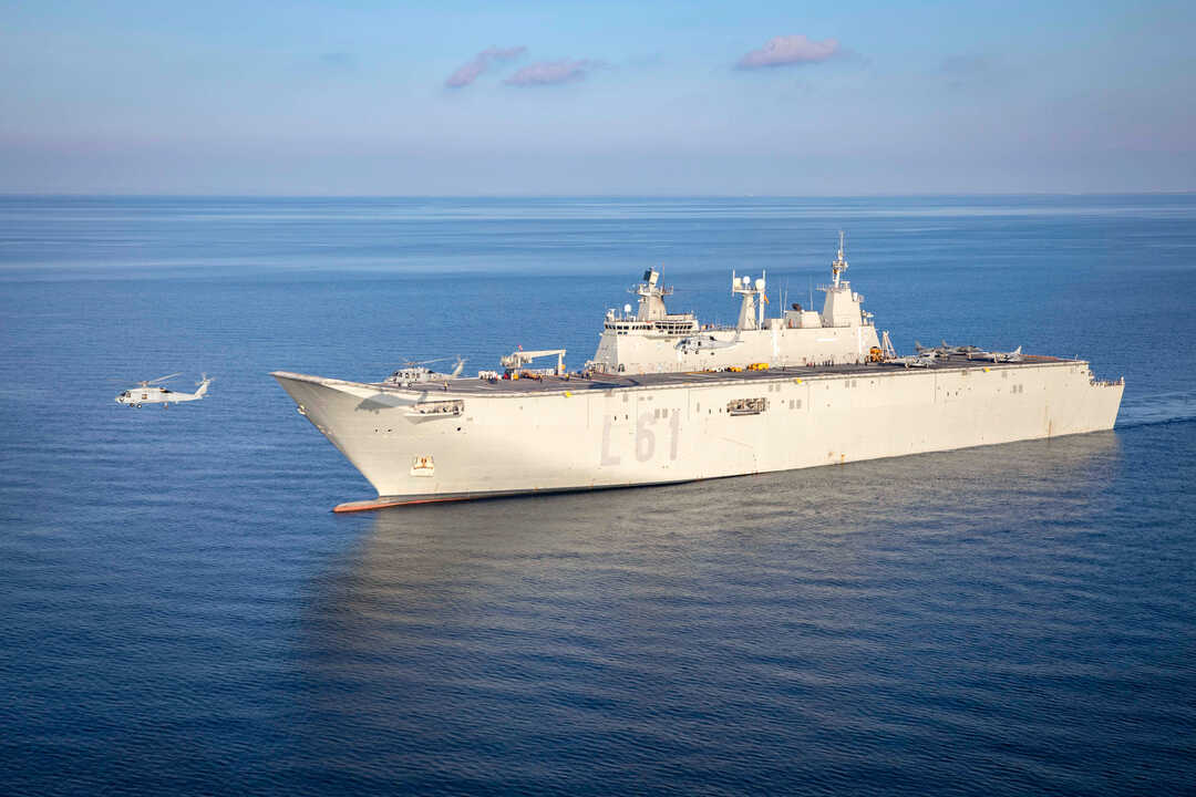 ADRIATIC SEA (Feb. 22, 2023) An MH-60S Sea Hawk helicopter attached to Helicopter Sea Combat Squadron (HSC) 5 and two Spanish navy SH-60B helicopters fly near the Spanish navy multi-purpose amphibious assault ship ESPS Juan Carlos I (LHD 61) during interoperability training in the Adriatic Sea, Feb. 22, 2023. Carrier Air Wing (CVW) 7 is the offensive air and strike component of Carrier Strike Group (CSG) 10 and the George H.W. Bush CSG. The squadrons of CVW-7 are Strike Fighter Squadron (VFA) 143, VFA-103, VFA-86, VFA-136, Carrier Airborne Early Warning Squadron (VAW) 121, Electronic Attack Squadron (VAQ) 140, HSC-5, and Helicopter Maritime Strike Squadron (HSM) 46. The George H.W. Bush CSG is on a scheduled deployment in the U.S. Naval Forces Europe area of operations, employed by U.S. 6th Fleet to defend U.S., allied and partner interests. (U.S. Navy photo by Mass Communication Specialist 3rd Class Samuel Wagner) - wikipedia