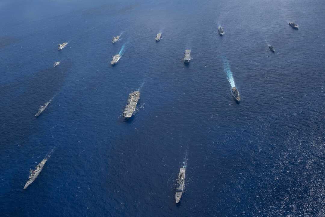 250720-N-TW227-1445 CORAL SEA (July 20, 2025) U.S. Navy ships from the America Strike Group, led by the forward-deployed amphibious assault ship USS America (LHA 6), sail in formation with Royal Australian Navy, Republic of Korea Navy, Royal New Zealand Navy, French Navy and Japan Maritime Self-Defense Force as part of Talisman Sabre 25, July 20. Talisman Sabre is the largest bilateral military exercise between Australia and the United States advancing a free and open Indo-Pacific by strengthening relationships and interoperability among key allies and partners, while enhancing our collective capabilities to respond to a wide array of potential security concerns. (U.S. Navy photo by Mass Communication Specialist 3rd Class Kenneth Melseth)